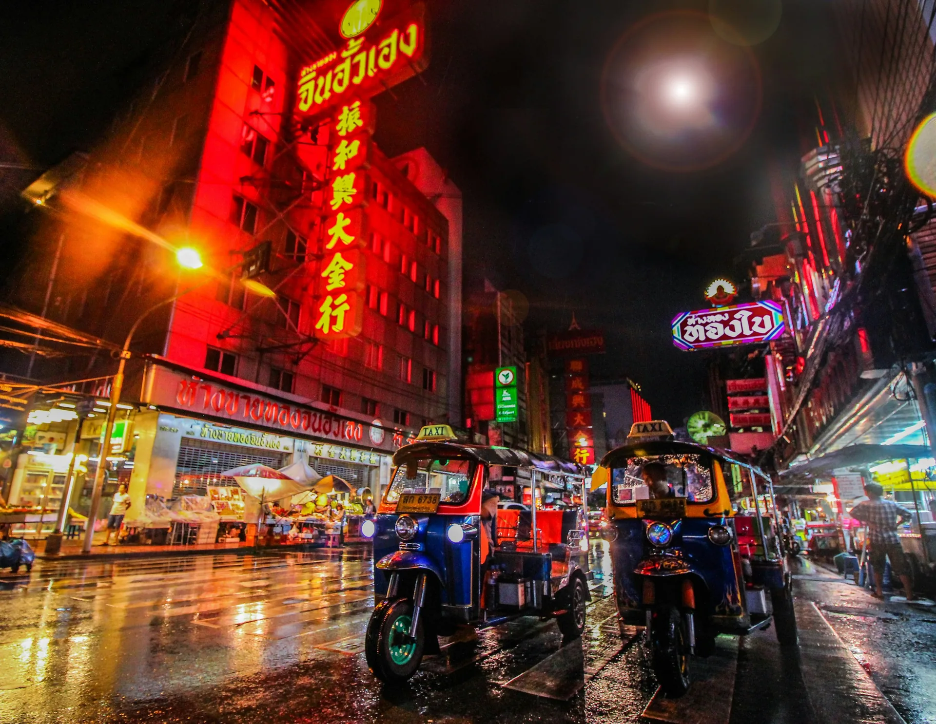 Neon signs and street life in Bangkok Chinatown